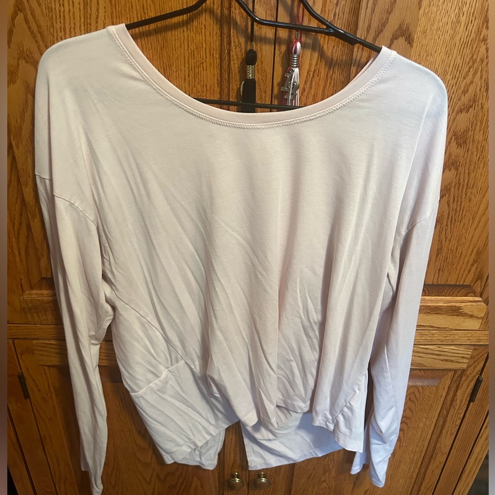 Light pink, open back, long sleeve tshirt